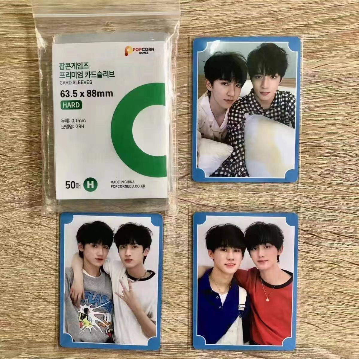 K-pop photocard sleeves protecting idol photocards